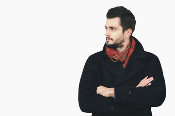 Portrait handsome elegant man crossed his arms looking away isolated on white background