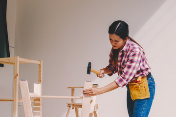 woman worker in the carpenter workroom.