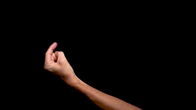 A White Hand Against The Normal Back Black Background Makes A Gesture Calling From The Left Of The Screen