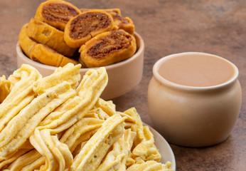 Indian Traditional Spicy Snack Ghatiya With Bhakarwadi Also Know as Ganthiya, Papdi, Gathiya, Bakarwadi, Bakarvadi, Bakar Vadi or Bakar Wadi Are Deep Fried Snack Made From Chickpea Flour.
