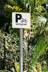 bicycle bay or bicycle parking sign in garden
