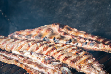 Barbecue grill with grilled pork ribs