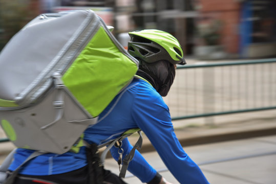 Bicycle Courier In Town.