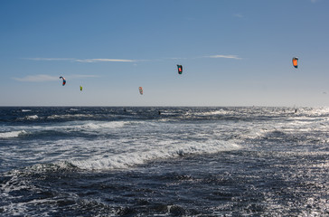 Aerial view of Kitesurfing on the waves of the sea. Kitesurfing, Kiteboarding action photos
