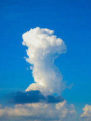 clouds in shape of heart on blue background