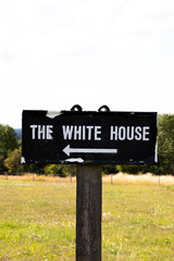 Dilapidated The White House sign in rural Hampshire, namesake of the official residence and workplace of the president of the United States of America