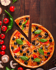pizza, mushrooms, olives, chicken, tomato sauce, cheese, (ingredients). hot pizza. Top view. copy space