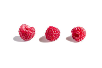 ripe fresh raspberries on a white background isolate