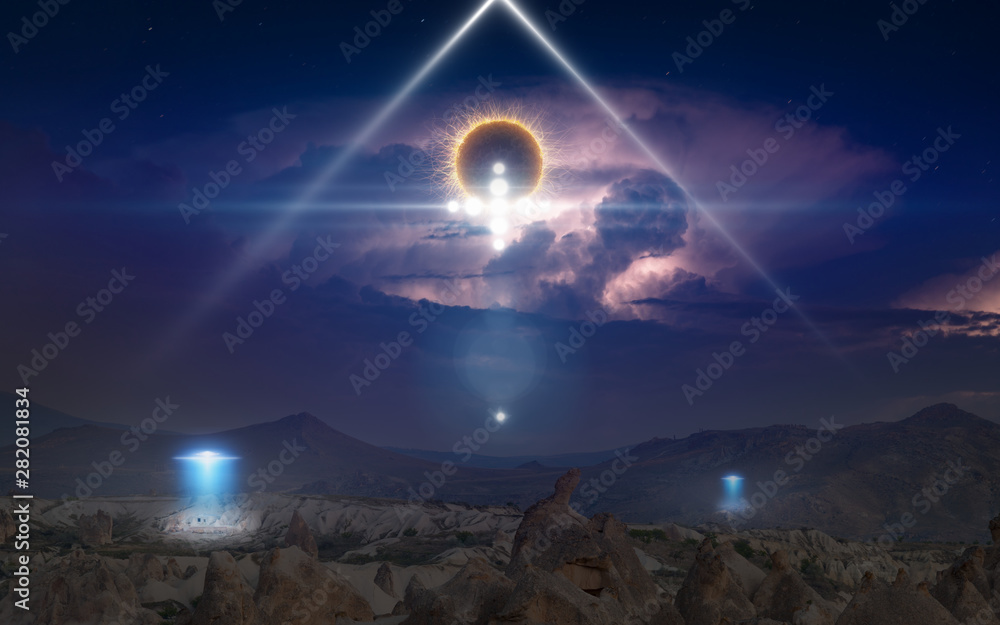 Wall mural alien ships inspect the planet's surface with bright spotlights, extraterrestrial spherical life for