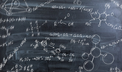 Molecule formulas on blackboard background