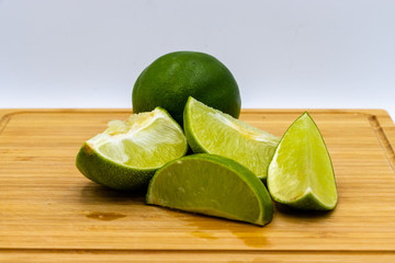 Colourful citrus on various back drops, lemons, limes, oranages. Calgary, Alberta, Canada