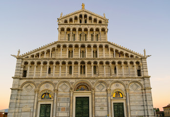 Fototapeta na wymiar Cathedral of the Archdiocese of Pisa, dedicated to Santa Maria Assunta, at Piazza dei Miracoli