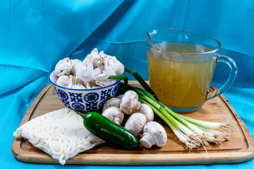 Won ton soup ingredients on a wooden cutting board. Calgary, alberta, Canada