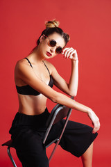 woman red lips. woman beautiful, red lips glasses, a beautiful girl with glasses