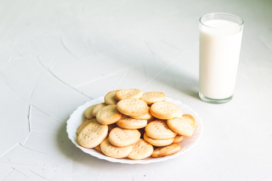 Sweet healthy homemade cookies on a white plate isolated, picture with space for text
