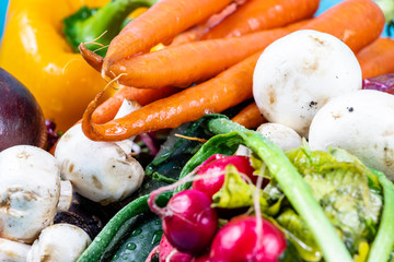 Colourful assorted raw vegetables on a wooden cutting board. Calgary, Alberta, Canada