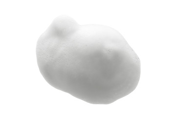 White cleanser foam texture isolated on white background. Cosmetic mousse, soap, shampoo bubbles. Macro, top view