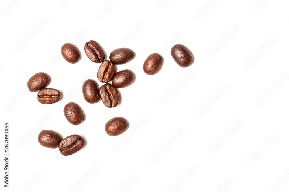 Wall mural a spread coffee beans isolated on white background and copy space