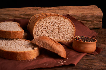Peppercorns in a wooden bowl on table with food rustic style. Homemade food
