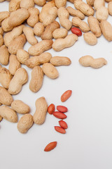 Large peeled peanuts close-up of beans in the shell. Unpeeled peanuts in the shell. Peanuts, for background or texture. Growing organic protein