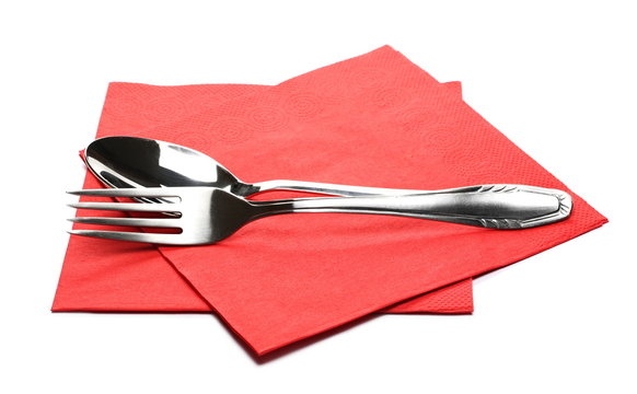 Paper Napkins With Fork And Metal Spoon Isolated On White Background