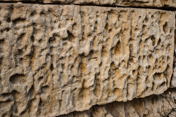 limestone bricks eroded and cracked