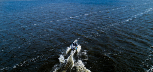 Aerial view of speed boat on water 