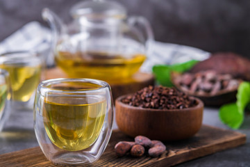 Hot Cacao Tea. Fresh hot chocolate herbal tea made of cacao bean flakes, which is rich in...