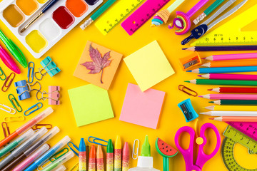 School office supplies on a desk with copy space