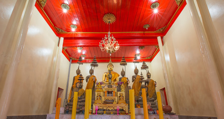 Interior of Thai temple with Buddha statues and altar in Wat Yai Ban Bo - Samut Sakhon, Thailand