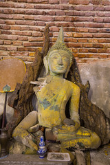 Dilapidated Buddha statue in Wat Yai Ban Bo - Samut Sakhon, Thailand