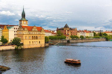 Fototapeta na wymiar Prague cityscape, view on tower and river