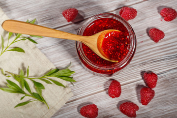 Homemade jam and fresh raspberry