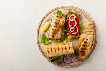 Traditional Turkish sandwich with a scorched mackerel