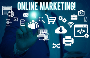 Conceptual hand writing showing Online Marketing. Concept meaning leveraging web based channels spread about companys brand Male human wear formal suit presenting using smart device