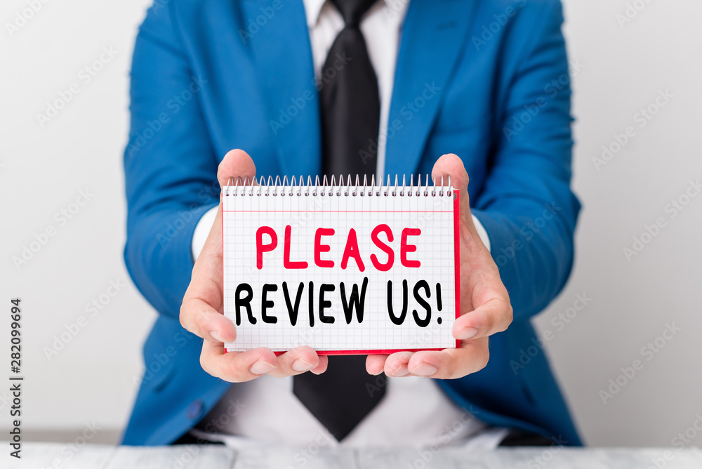 Poster Handwriting text Please Review Us. Conceptual photo situation or system is formal examination by showing authority Man holds empty paper with copy space in front of him Copy Space