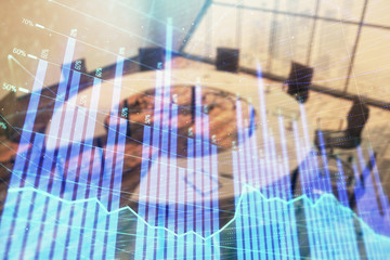 Double exposure of forex chart on conference room background. Concept of stock market analysis