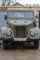 Tetyushy, Tatarstan/ Russia - May 02, 2019: Retro car GAZ-69 near the house in the street. Old vintage car GAZ-69 is a four-wheel drive light truck, produced by GAZ.