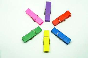 Many colorful Clothespin on a white background