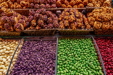 Istanbul, Turkey, Various of traditional Turkish delicious sweets in the Egyptian spicy market and the Grand Bazaar with rahat lukum in counter.