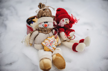 Merry christmas and happy new year greeting card with copy-space. Two Happy snowman standing in winter christmas landscape. Snow winter background.