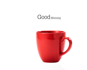 red ceramic mug on white background
