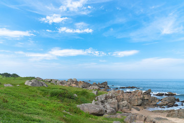 Fototapeta premium Beautiful Tanesashi kaigan Coast. The coastline includes both sandy and rocky beaches, and grassy meadows scenic views