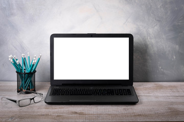 Fototapeta premium Workspaces mock up Laptop on wood table with glass phone smartphone pencil apple notebook mouse desk with copy space for graphics or products display montage.Working place of designer,close-up Office.