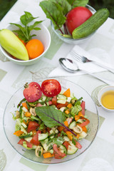 Fresh mixed vegetables salad close-up. Diet, healthy food