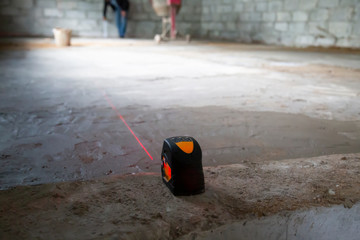 Device for construction for leveling the floor. Cement screed floor.