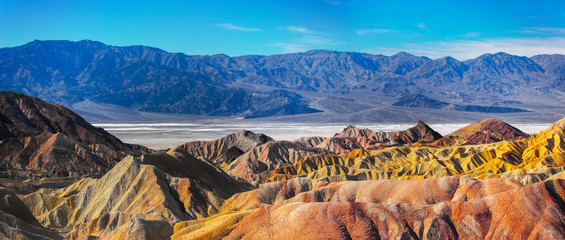 An evening view from Zabriskie Point to Golden Canyon, Death Vally National Park - obrazy, fototapety, plakaty