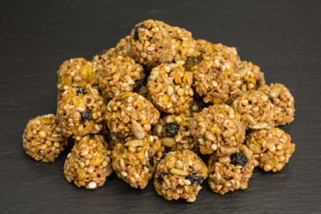 heap of granola cereal bites with quinoa and dried blueberries