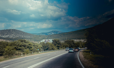 Fototapeta premium Russian asphalt roads. Background road. Roads in the mountains of Crimea. Travel by car. Road views.