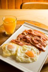 American breakfast with eggs and bacon